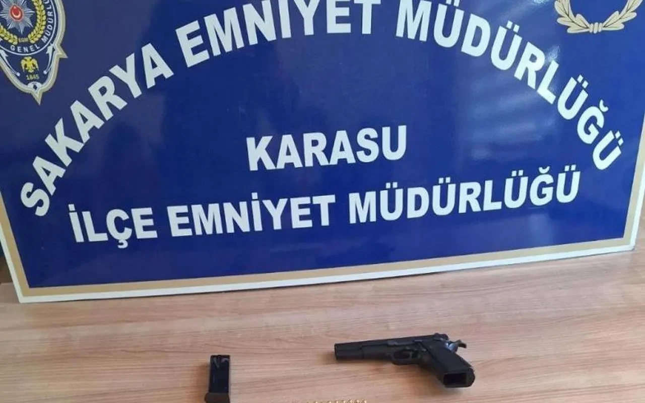 Karasu'da aranan suçlu ruhsatsız silahla yakalandı