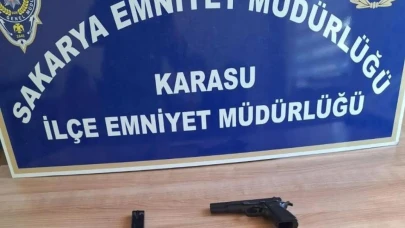 Karasu'da aranan suçlu ruhsatsız silahla yakalandı