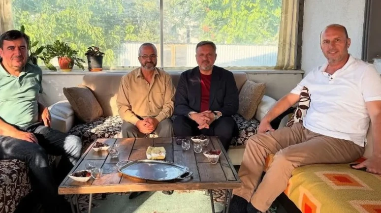 Başkan Dokuzlar hacdan dönen vatandaşları ziyaret etti